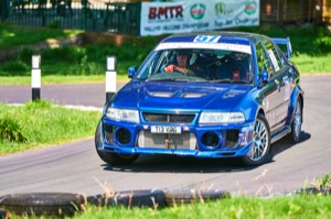 57 - Paul Harris driving a Mitsubishi Evo 6