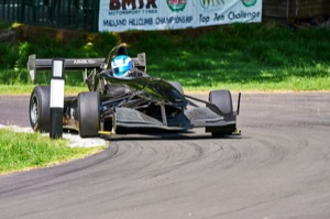 810 - Clive Austin driving a Empire Wraith