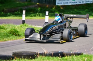 810 - Clive Austin driving a Empire Wraith